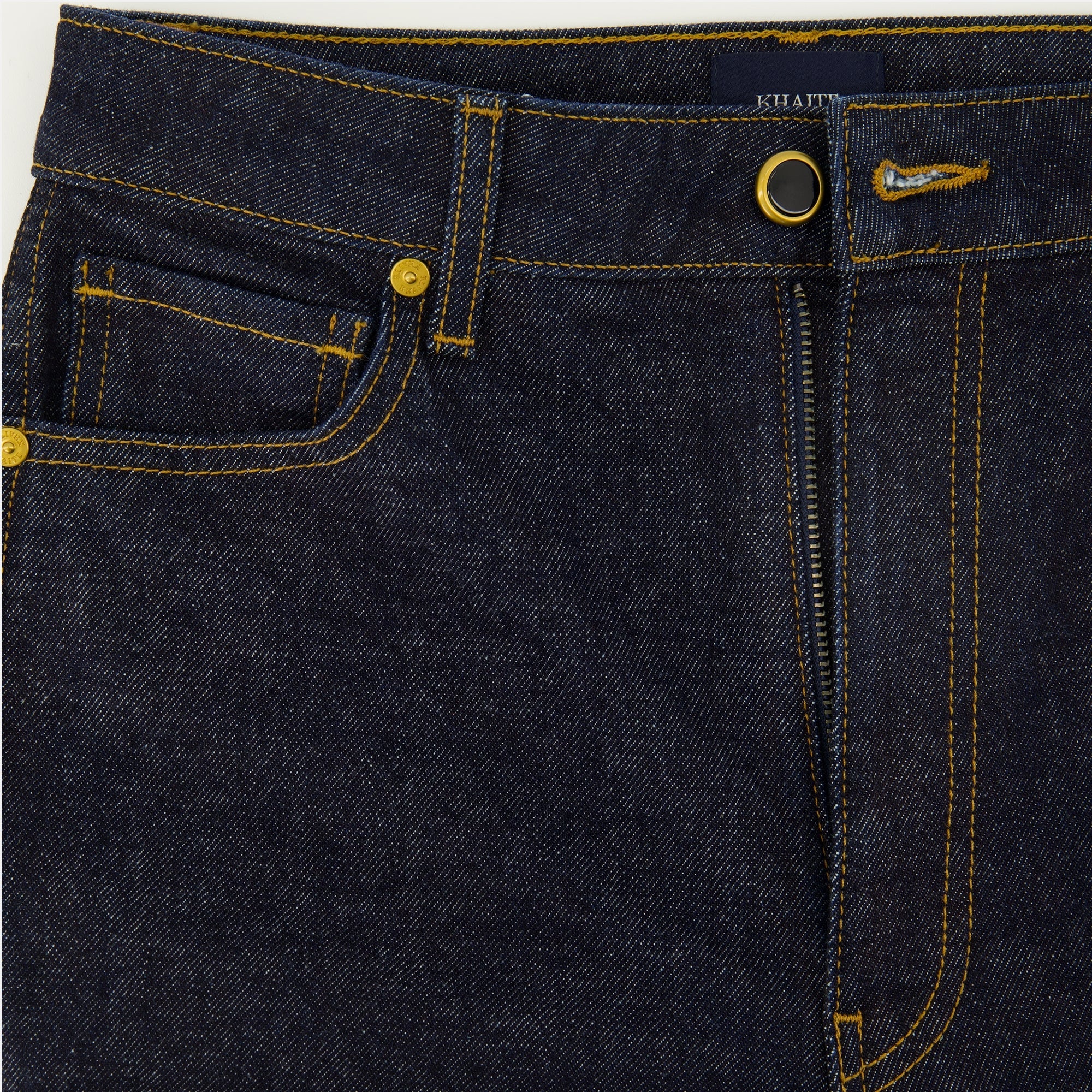 Khaite jeans, flare jeans, high-rise denim, deep blue jeans, five-pocket design