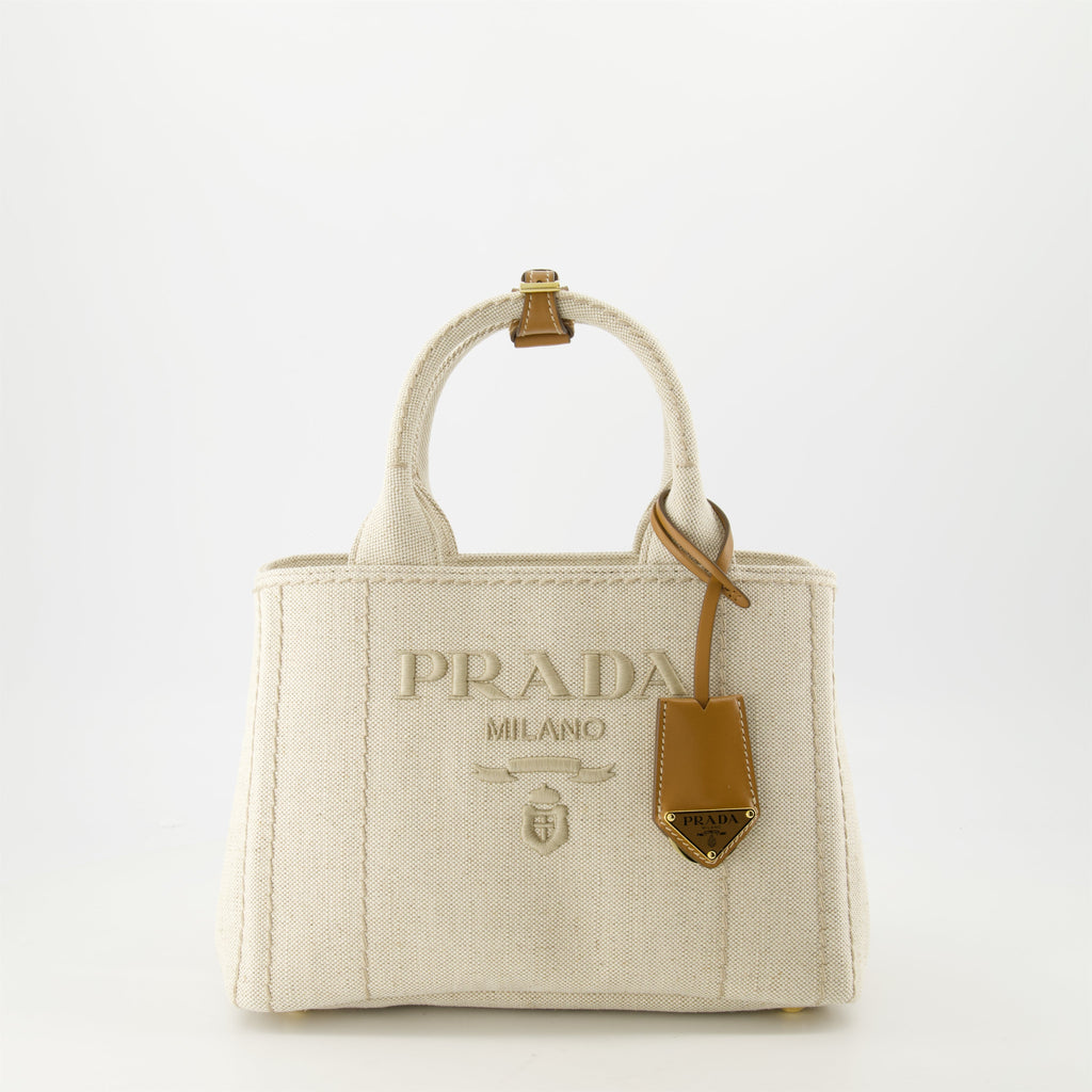 canvas tote bag, Prada, beige tote, luxury accessories, embroidered logo