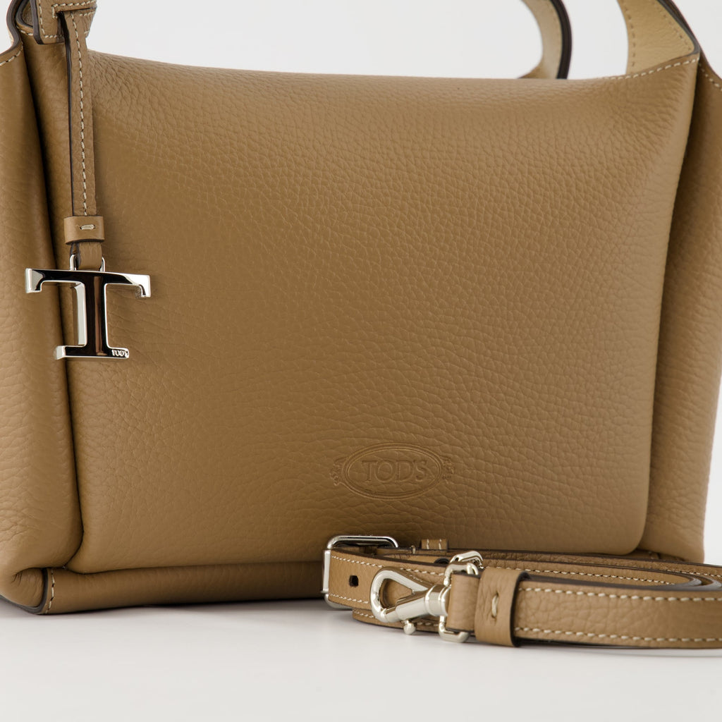 brown leather bag, Tod's Bauletto, stylish handbag, calf leather accessory, versatile bag