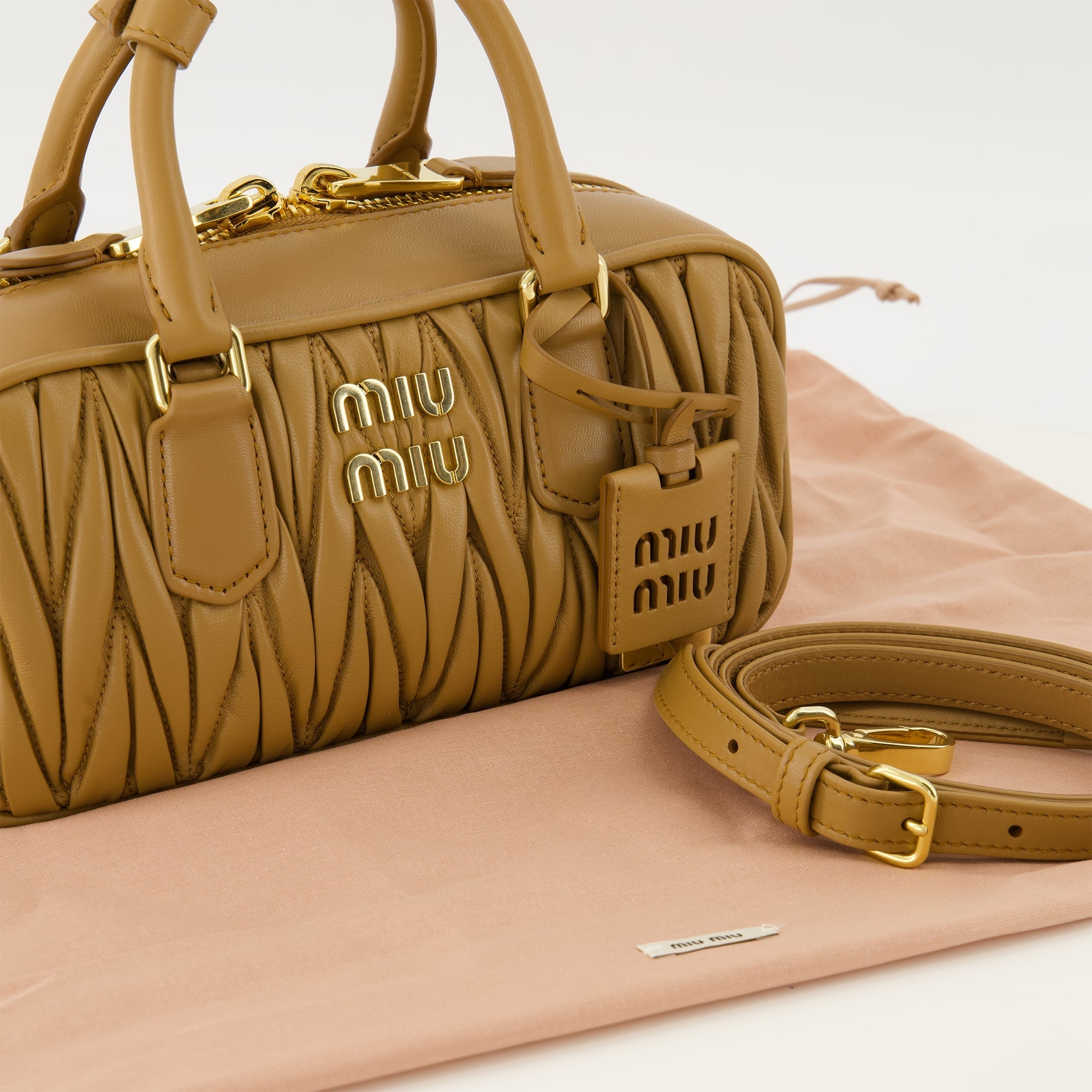 Miu Miu handbag, quilted leather bag, brown handbag, luxury accessories, designer bags