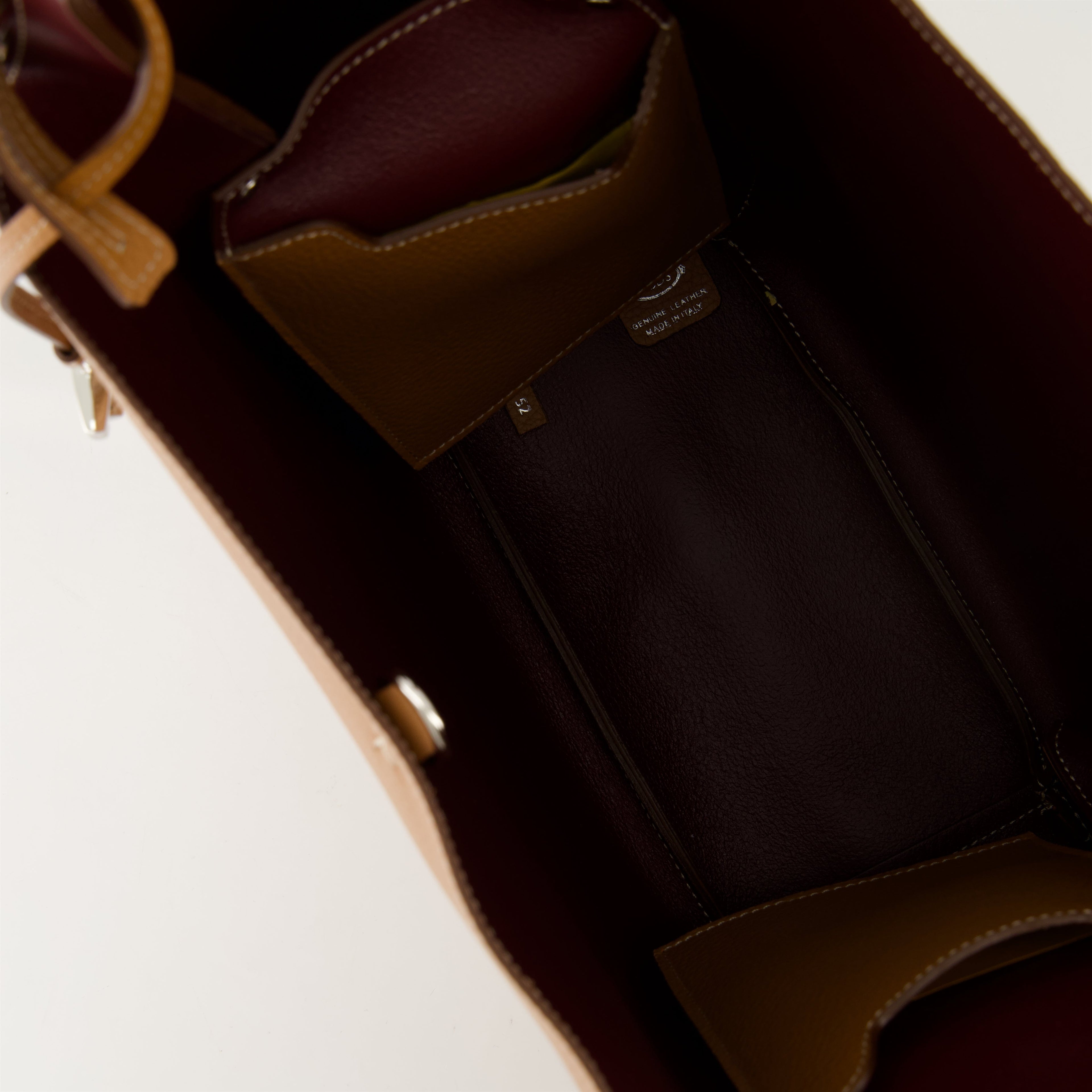 brown leather bucket bag, Tod's bag, luxury accessories, designer handbag, camel leather bag