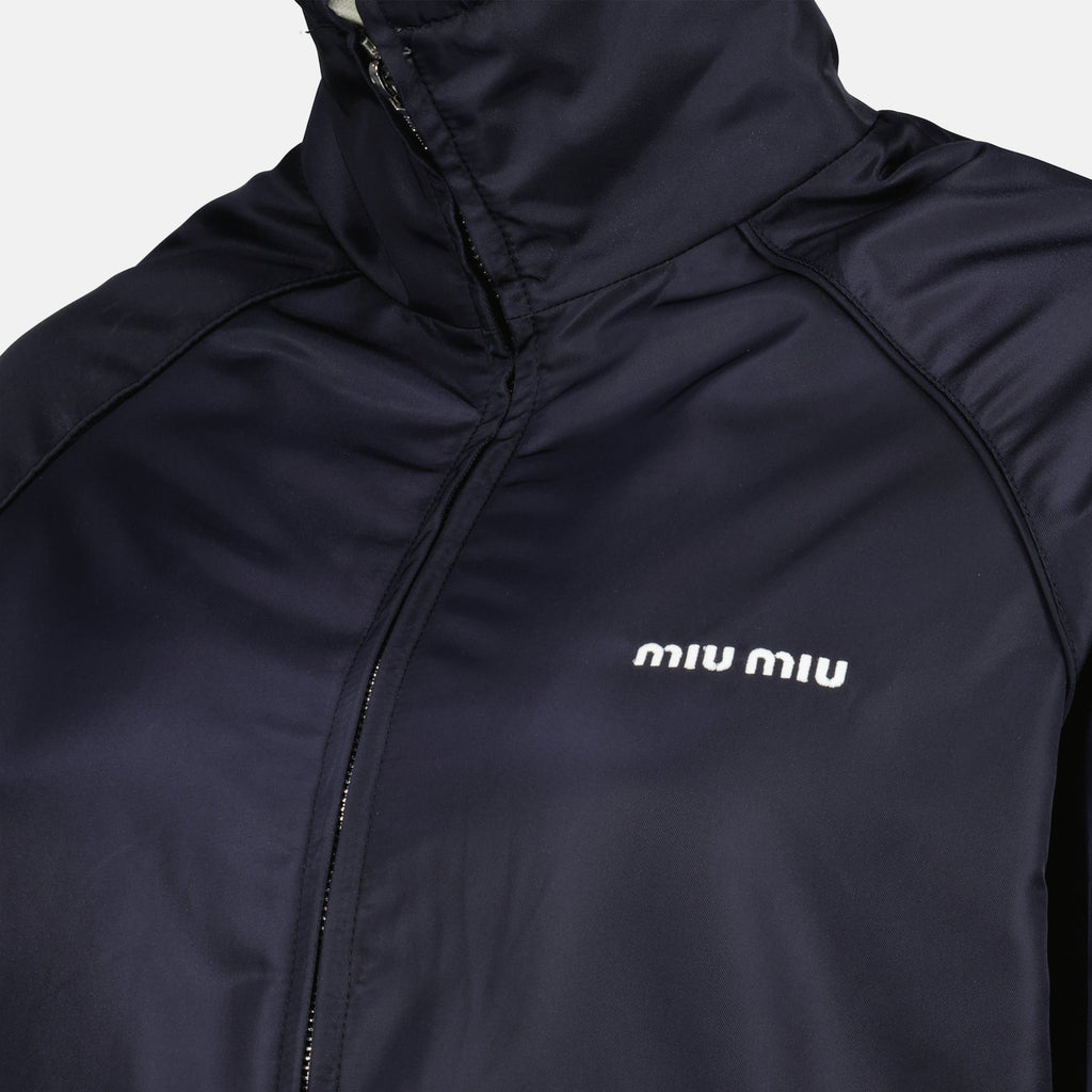 Imagem do blusão reversível azul e cinza da Miu Miu para mulheres - Temporada Primavera-Verão 2026 - Detalhe Vista 5