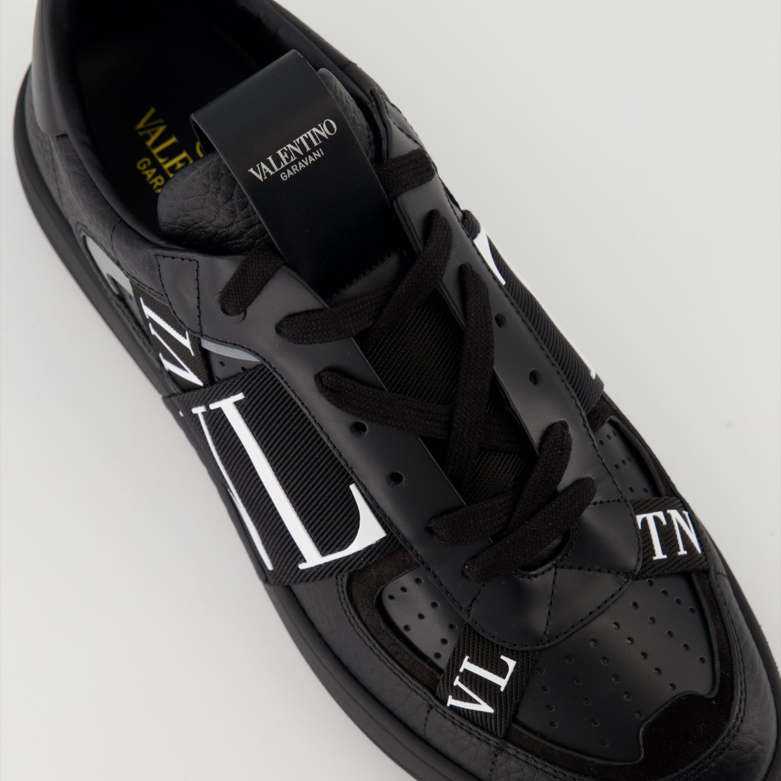 Valentino VLTN sneakers, black calf leather sneakers, two-tone design sneakers, men's luxury sneakers, designer lifestyle footwear