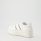 luxurious sneakers, Valentino Garavani, white leather shoes, Rockstud sneakers, flatform sneakers