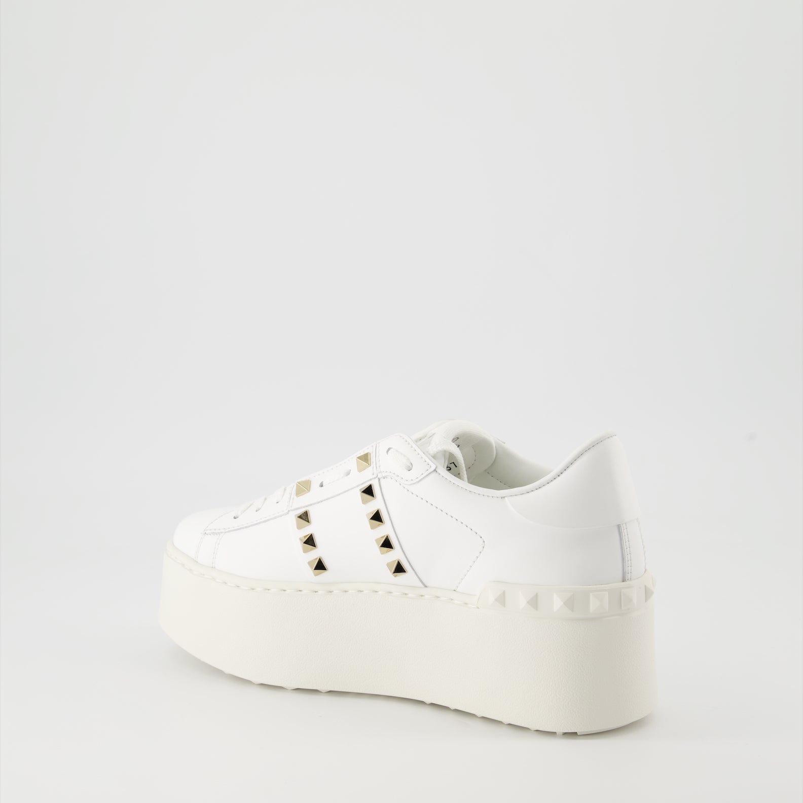 luxurious sneakers, Valentino Garavani, white leather shoes, Rockstud sneakers, flatform sneakers
