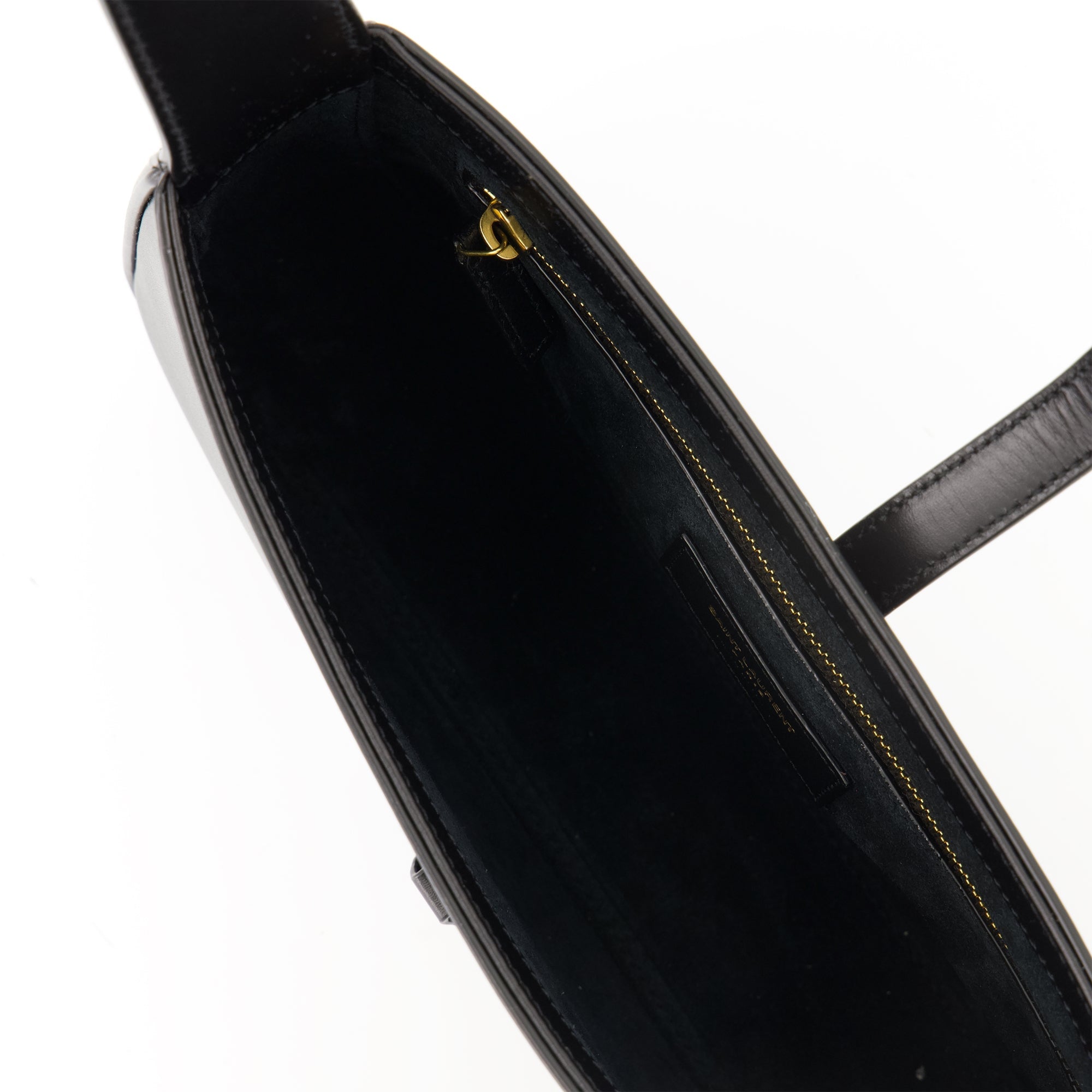 Saint Laurent bag, black leather bag, luxury accessories, designer handbag, fashion essentials