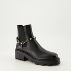 Imagen de las botas de tobillo de cuero Rockstud de Valentino Garavani para mujeres - Temporada Otoño-Invierno 2024 - Vista tres cuartos frontal derecha