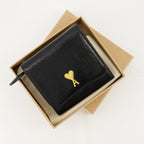 black leather wallet, AMI Paris, grained leather, practical wallet, stylish accessory