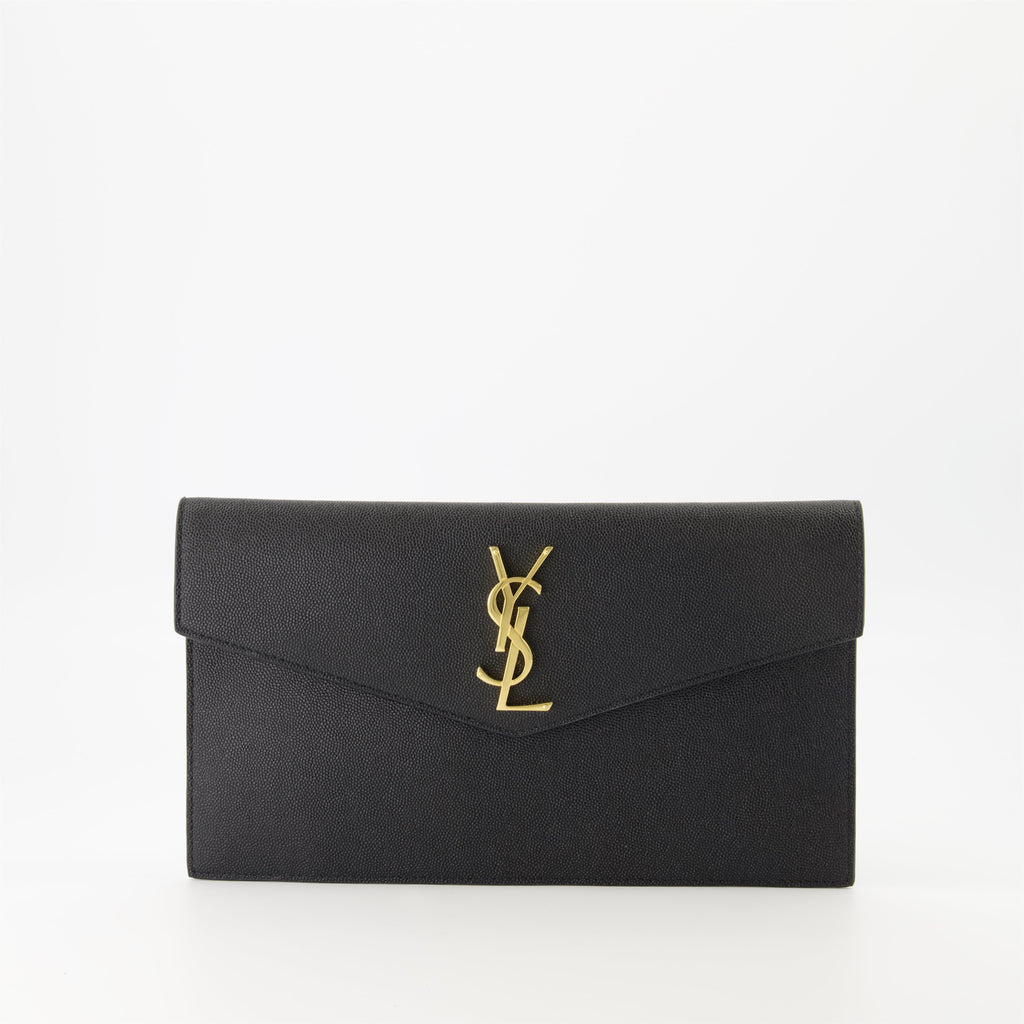 black pouch, grained leather, magnetic closure, Saint Laurent, Cassandre logo
