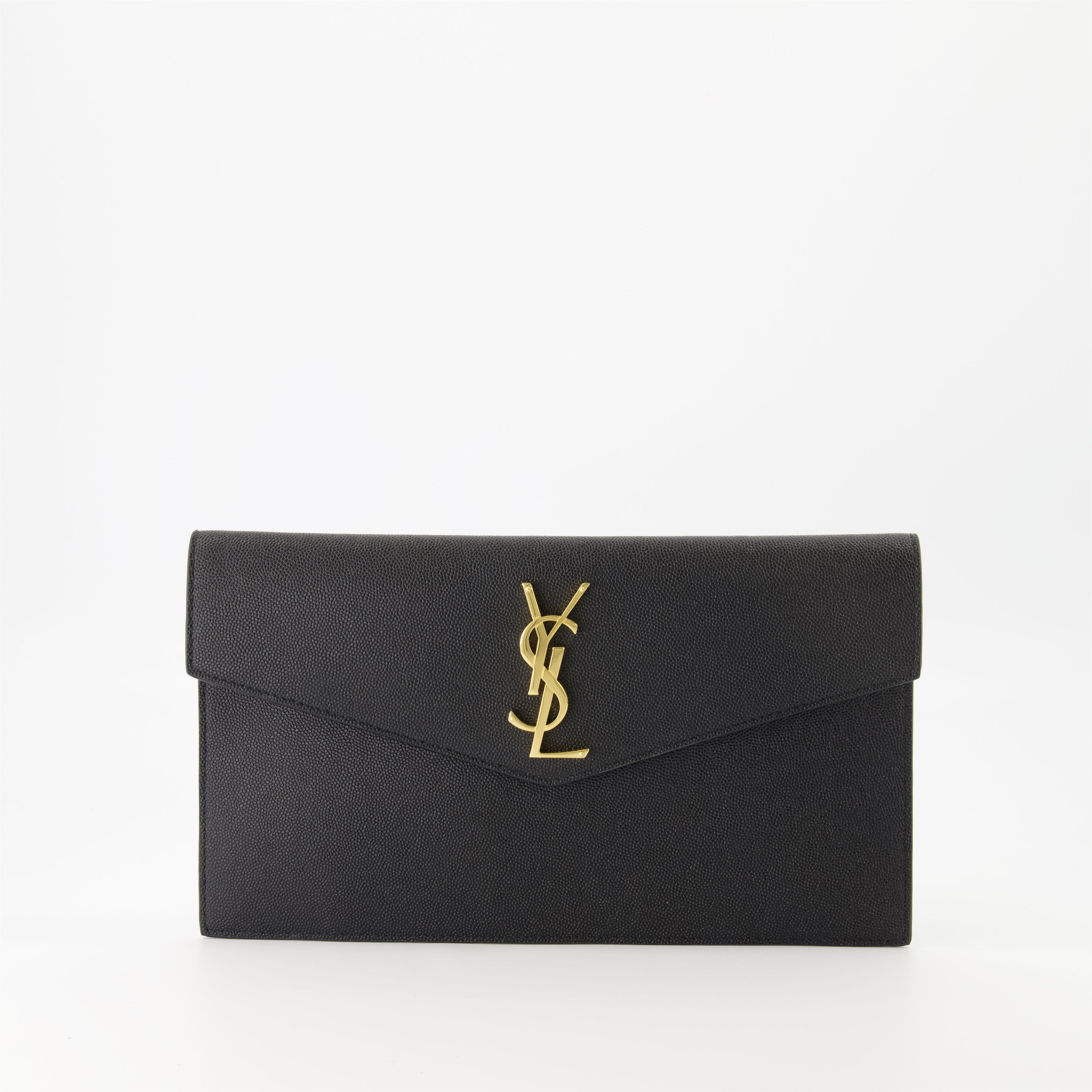 black pouch, grained leather, magnetic closure, Saint Laurent, Cassandre logo