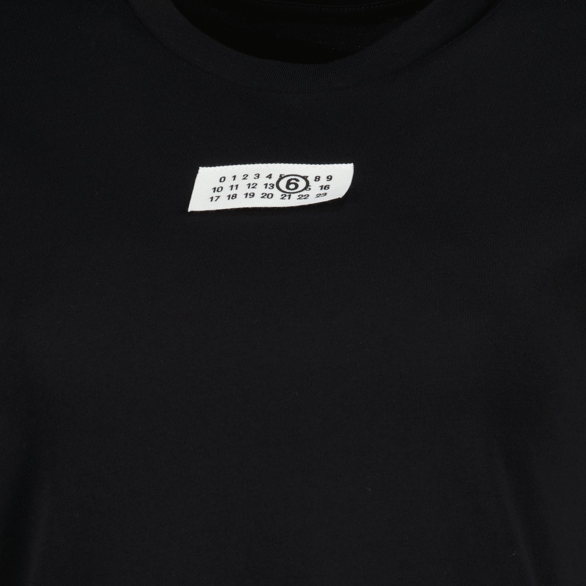 Image of Numeric Black T-Shirt by Mm6 for Women - Season Spring-Summer 2026 - Detail View 1