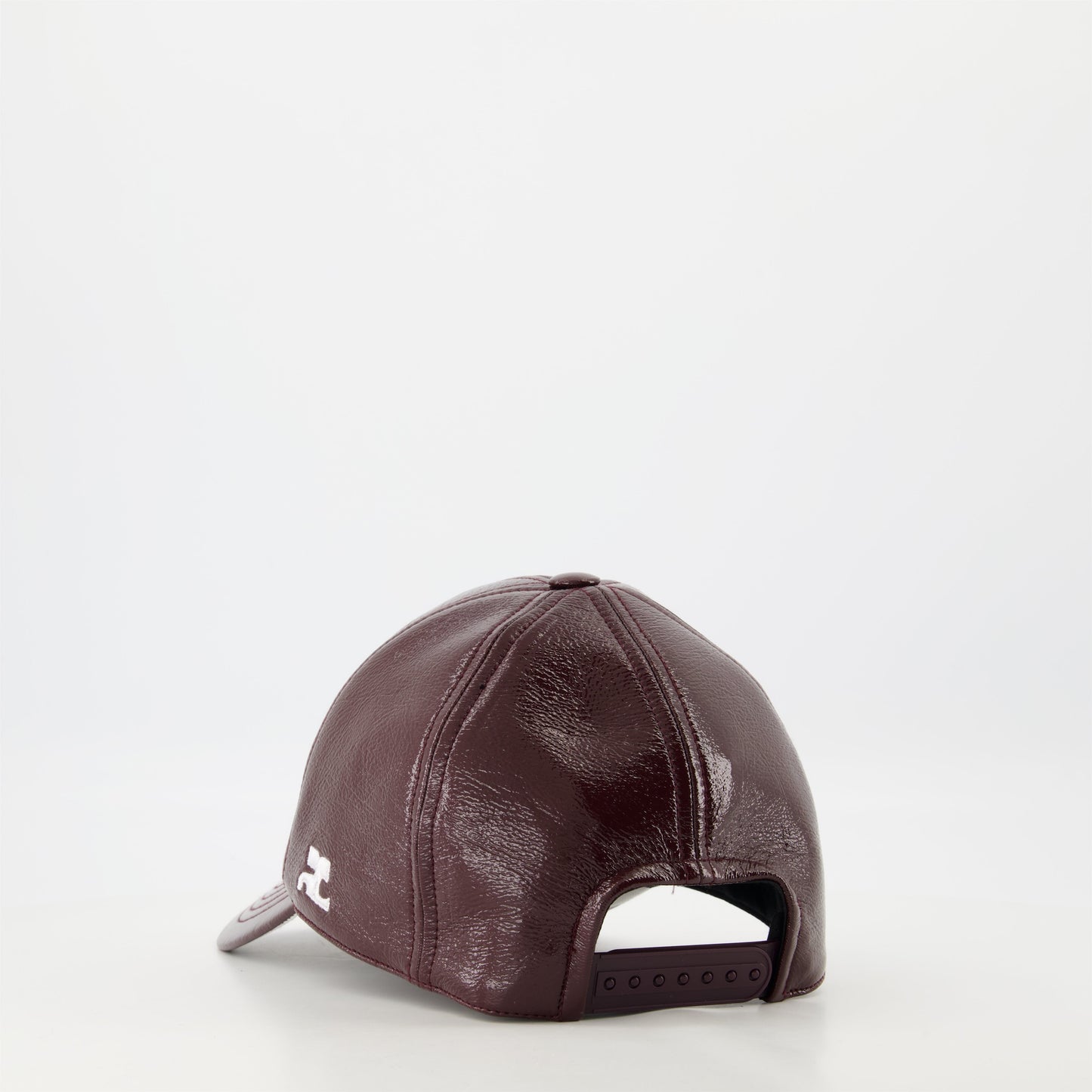 Courrèges cap, burgundy vinyl, adjustable cap, unisex fashion, embossed logo