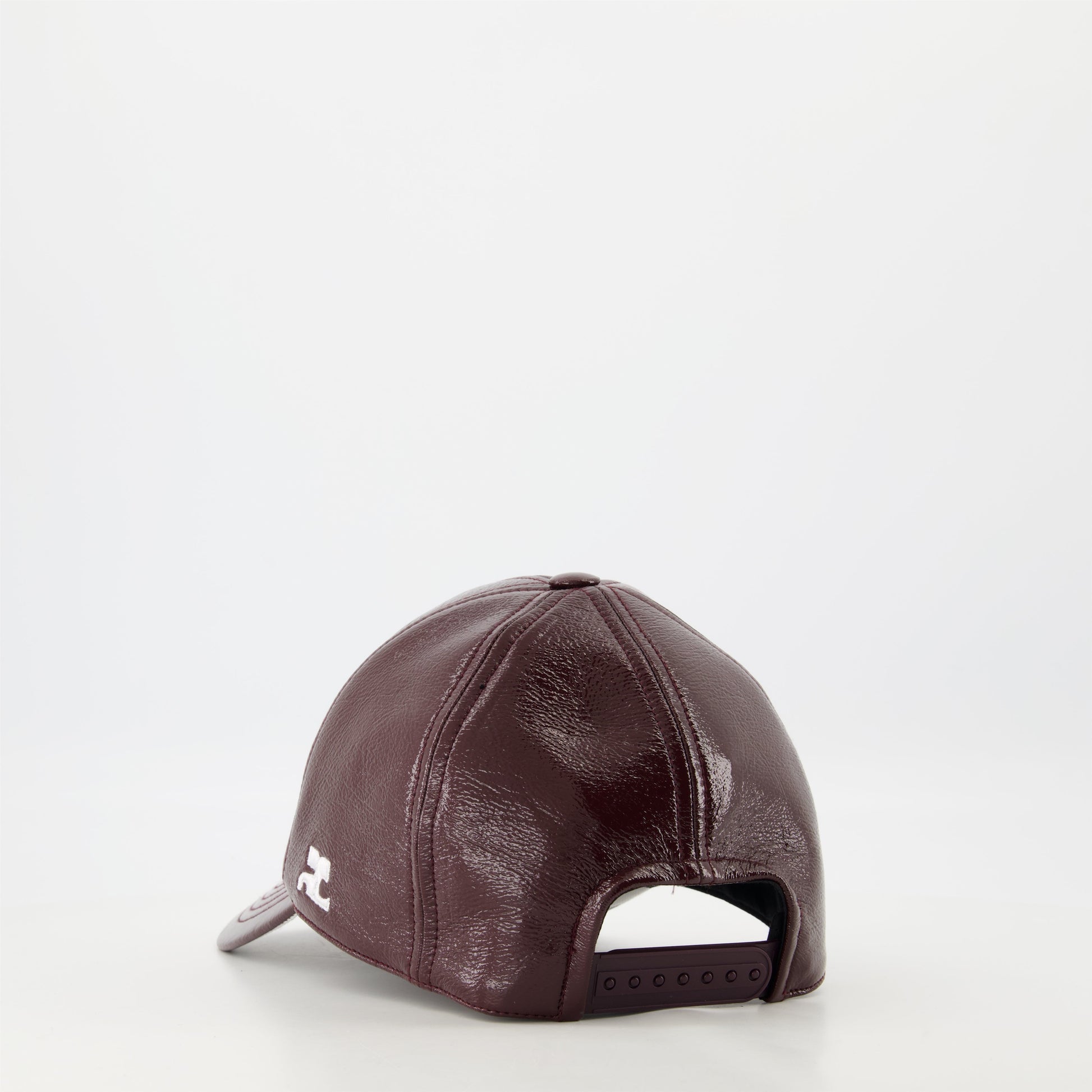 Courrèges cap, burgundy vinyl, adjustable cap, unisex fashion, embossed logo