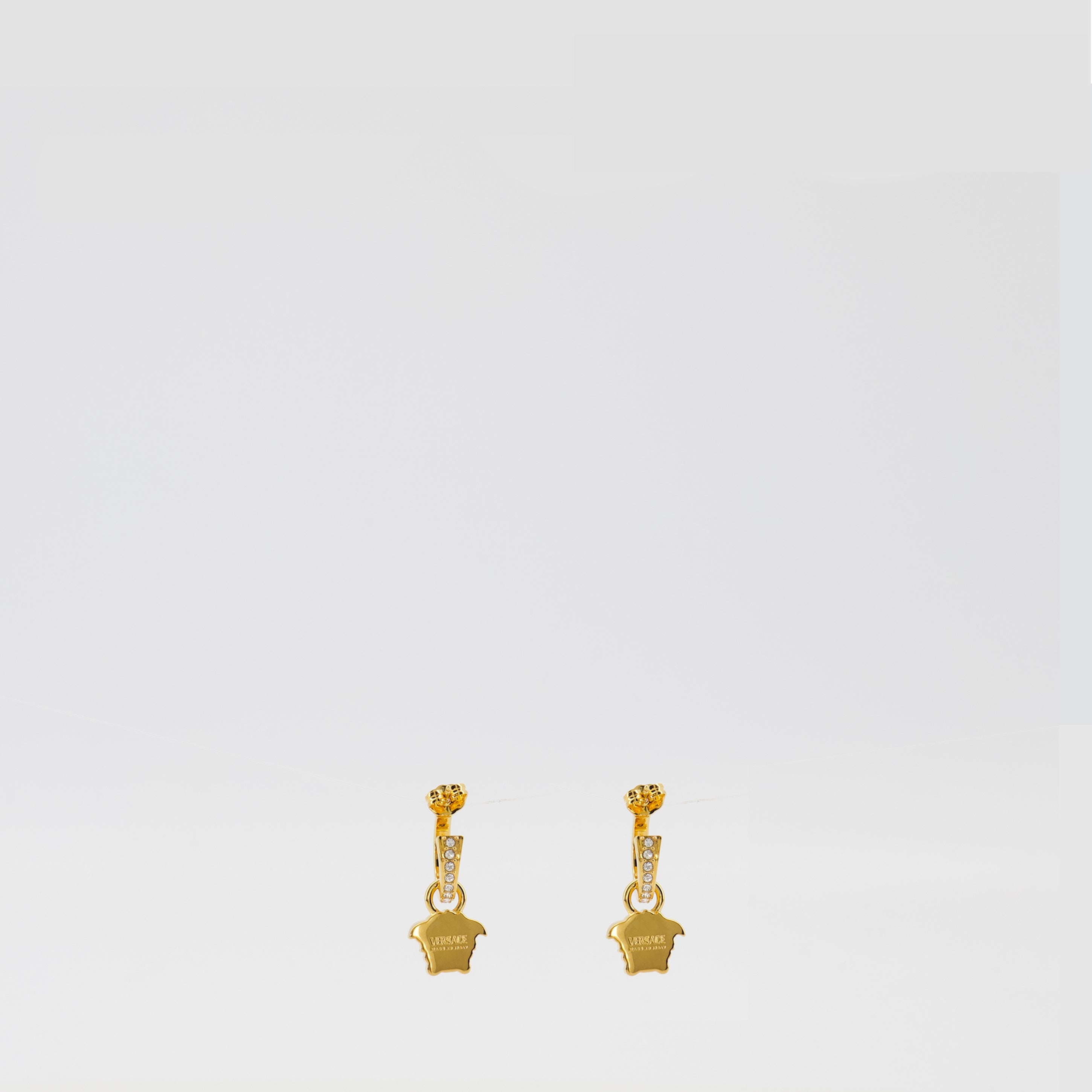 La Medusa earrings, golden hoop earrings, crystal earrings, designer accessories, Medusa logo jewelry