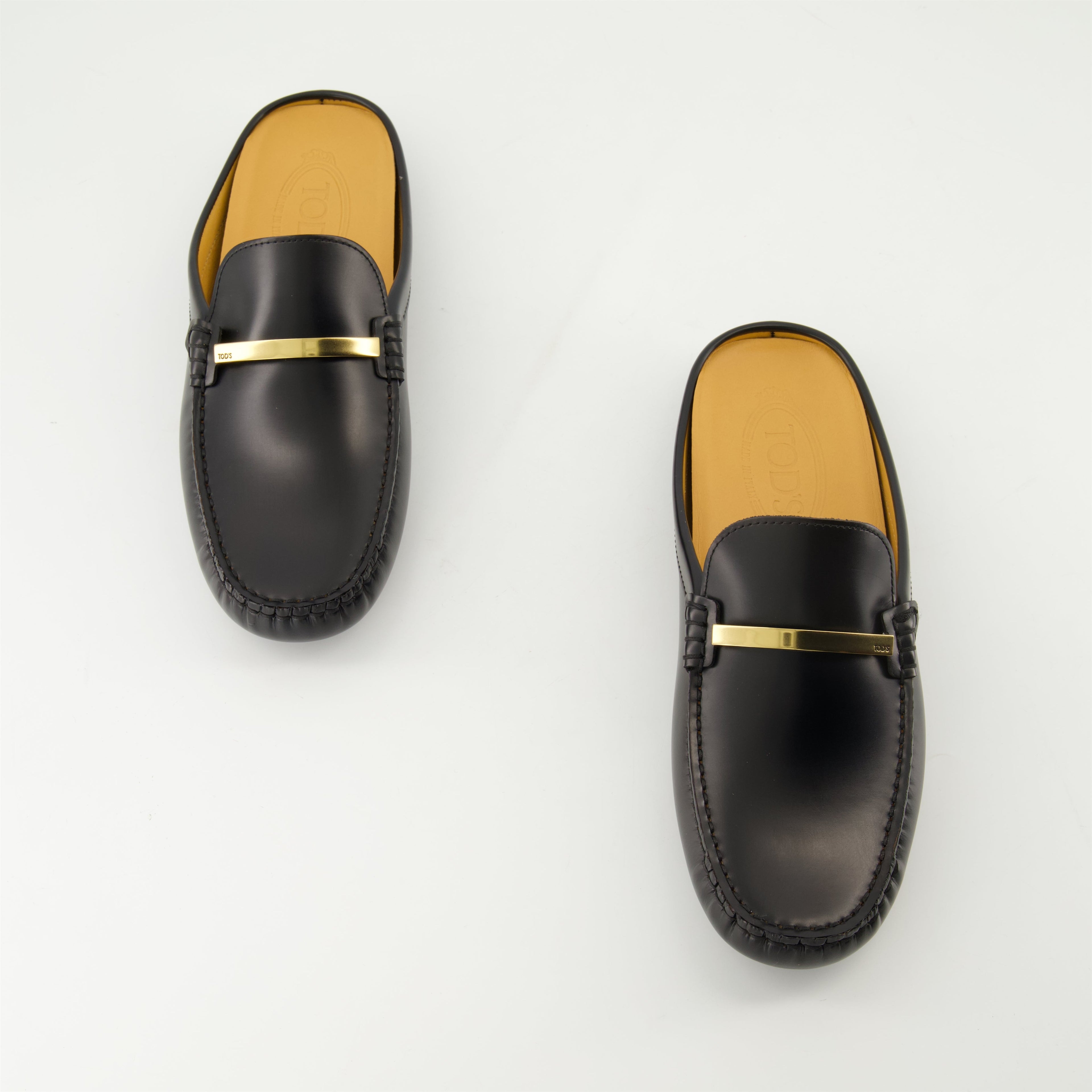 Bild von schwarzen Gommino-Leder-Mules von Tod's für Damen - Saison Frühjahr-Sommer 2025 - Obenansicht des Paares