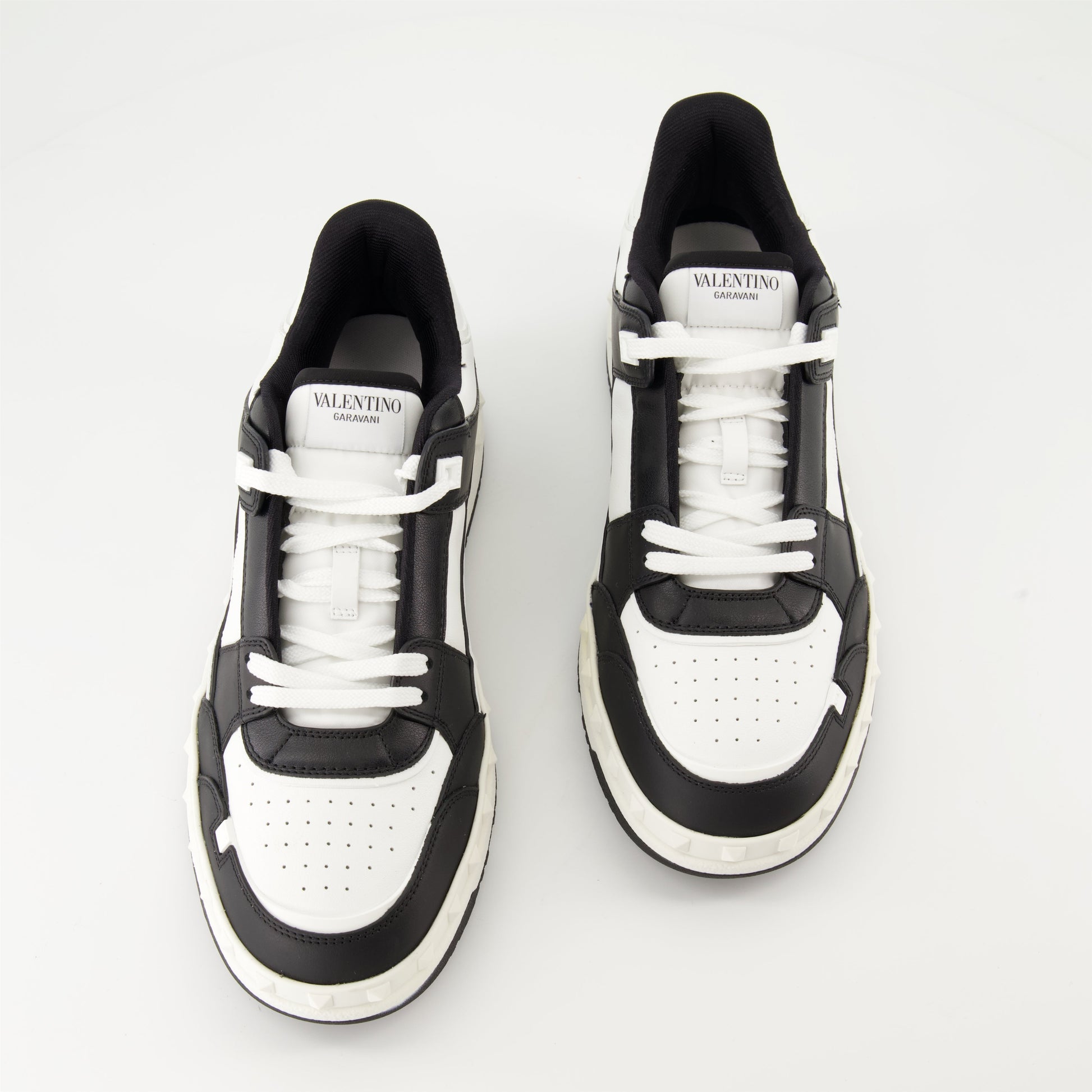 Valentino Garavani sneakers, black and white leather sneakers, luxury footwear, designer sneakers, high-end fashion