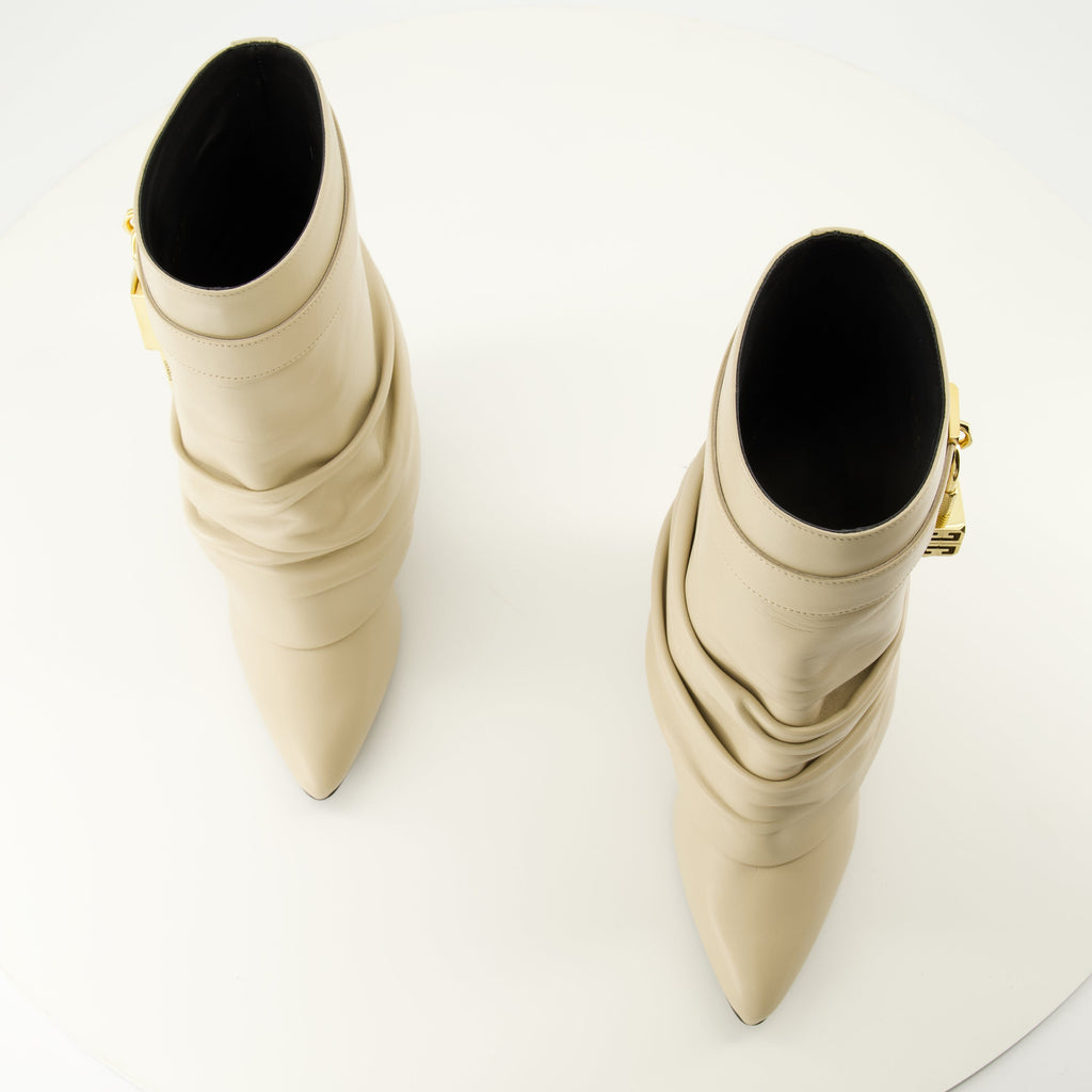 Givenchy booties, Shark Lock Stiletto, nappa leather footwear, golden metallic details, high-end women's shoes