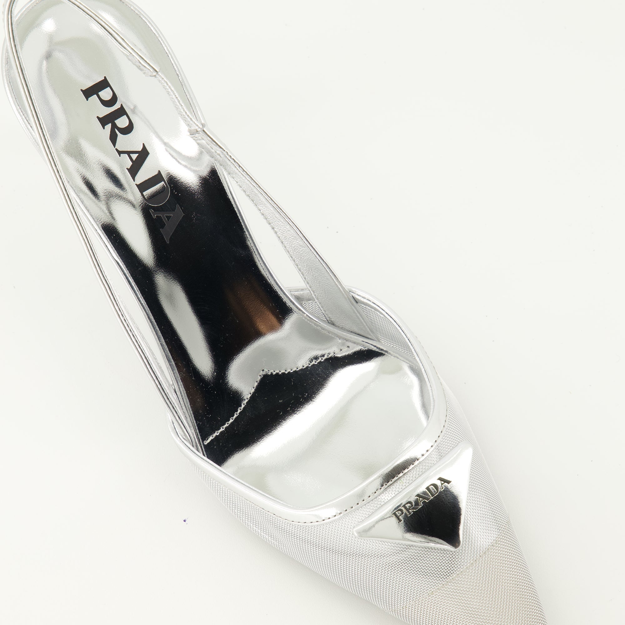 silver mesh heels, Prada footwear, pointed toe heels, elegant shoes, spring-summer collection