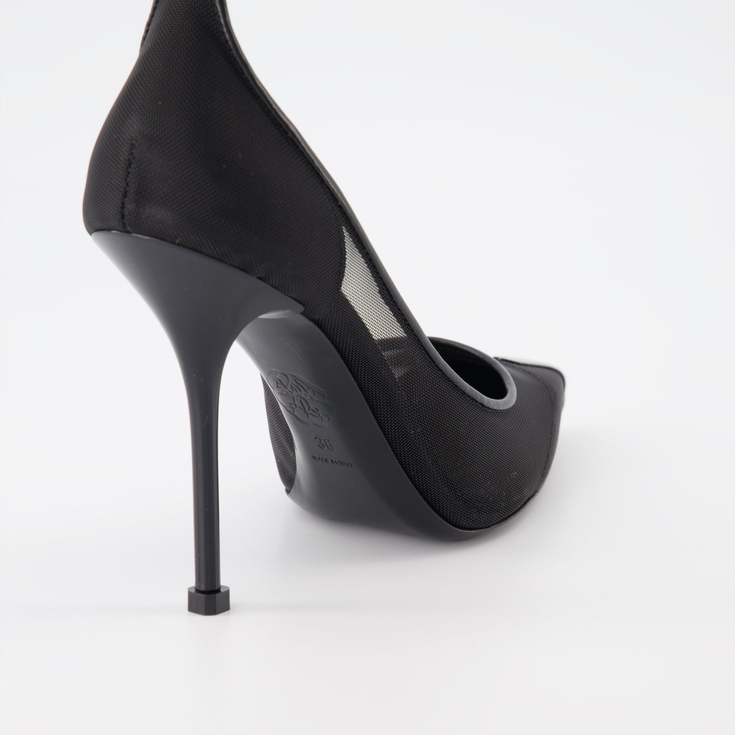 Alexander McQueen heels, black punk strap heels, luxury women's shoes, designer strap heels, high-end stilettos