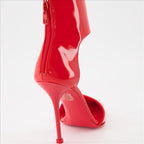 Punk pumps, Alexander McQueen, red leather, luxury shoes, metal pointed toe