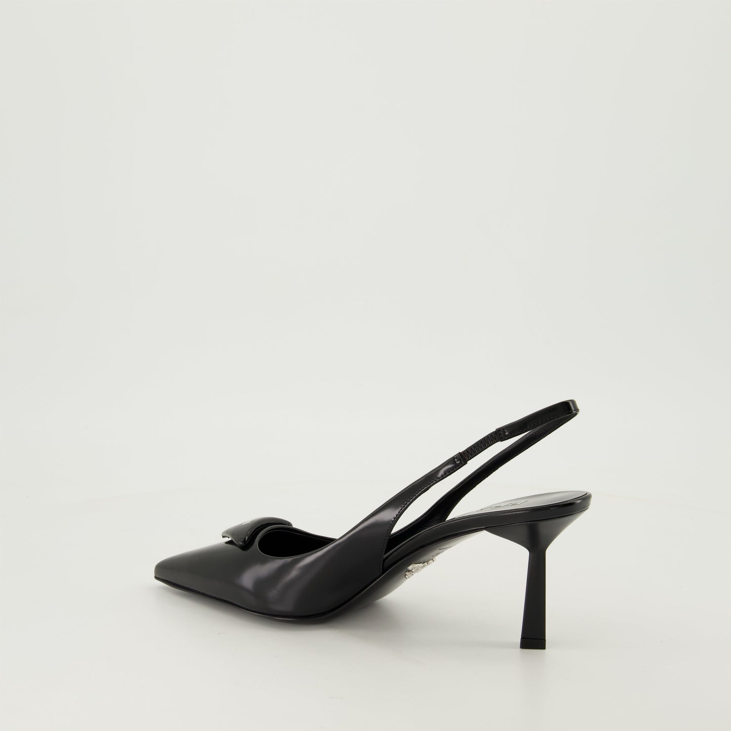 pointed toe pump, black leather shoe, Prada pump, elegant footwear, leather heel