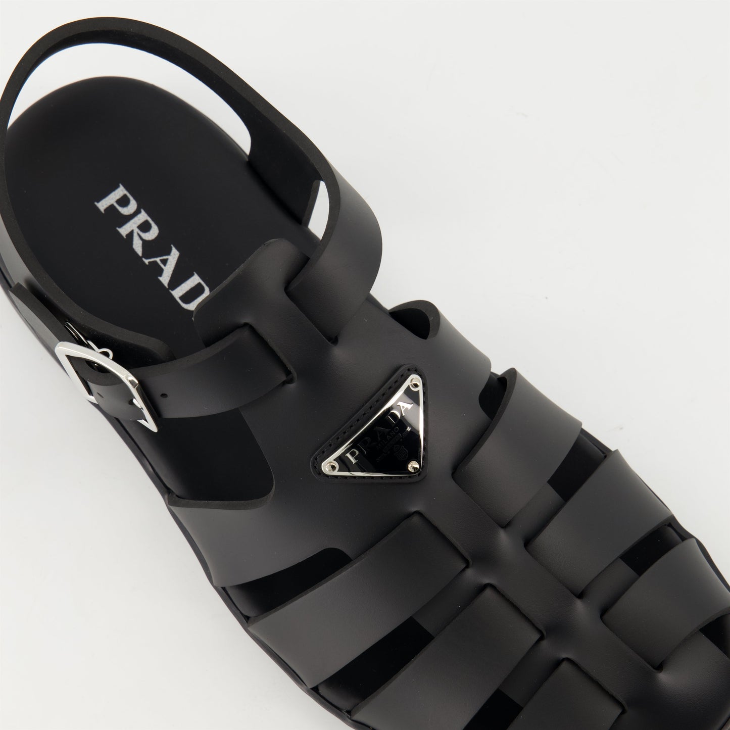 fisherman sandals, black rubber sandals, Prada footwear, adjustable sandals, casual footwear