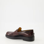 Immagine dei mocassini in pelle nera di Tod's per donne - Stagione Autunno-Inverno 2025 - Vista posteriore destra in tre quarti