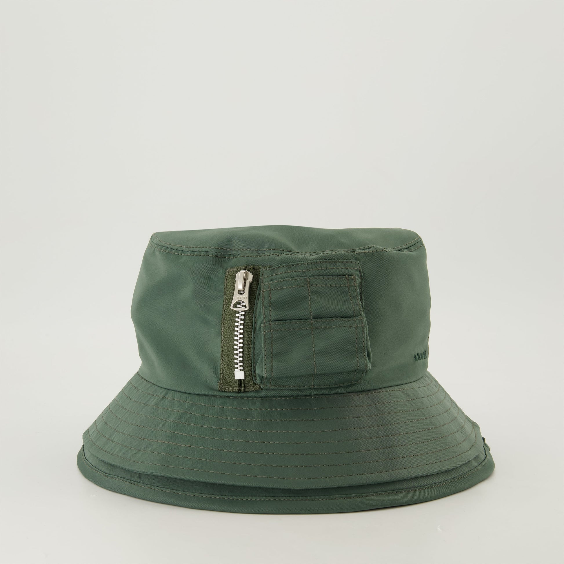 Green bucket hat, Sacai bucket hat, embroidered logo hat, layered design hat, seasonal accessories