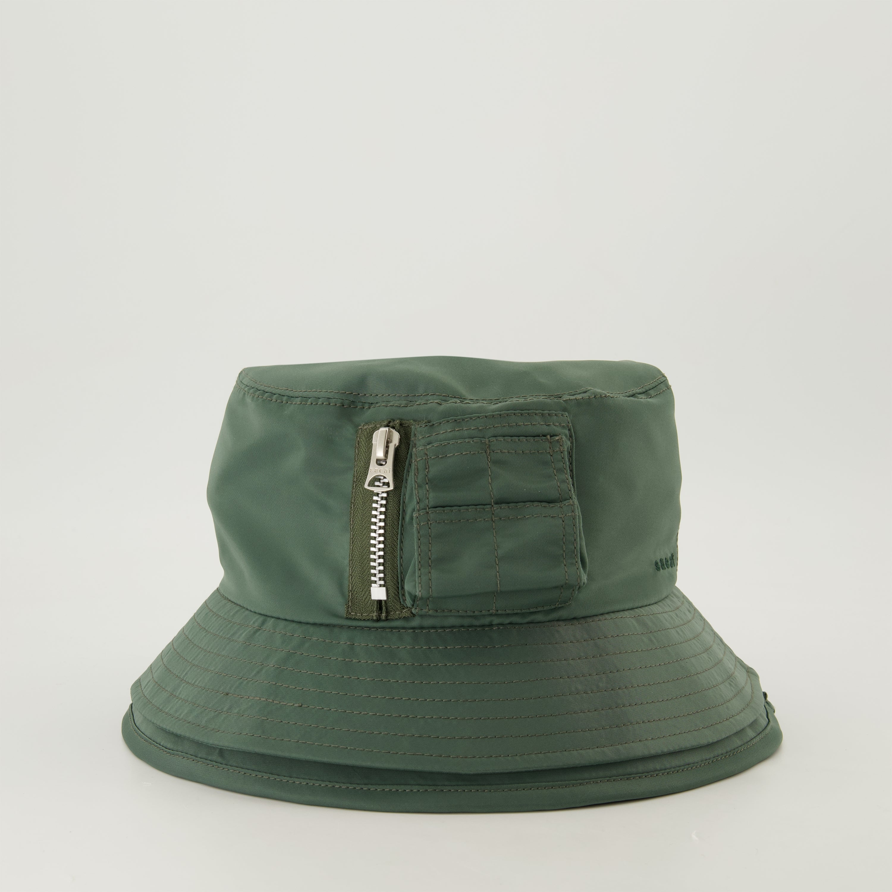 Green bucket hat, Sacai bucket hat, embroidered logo hat, layered design hat, seasonal accessories