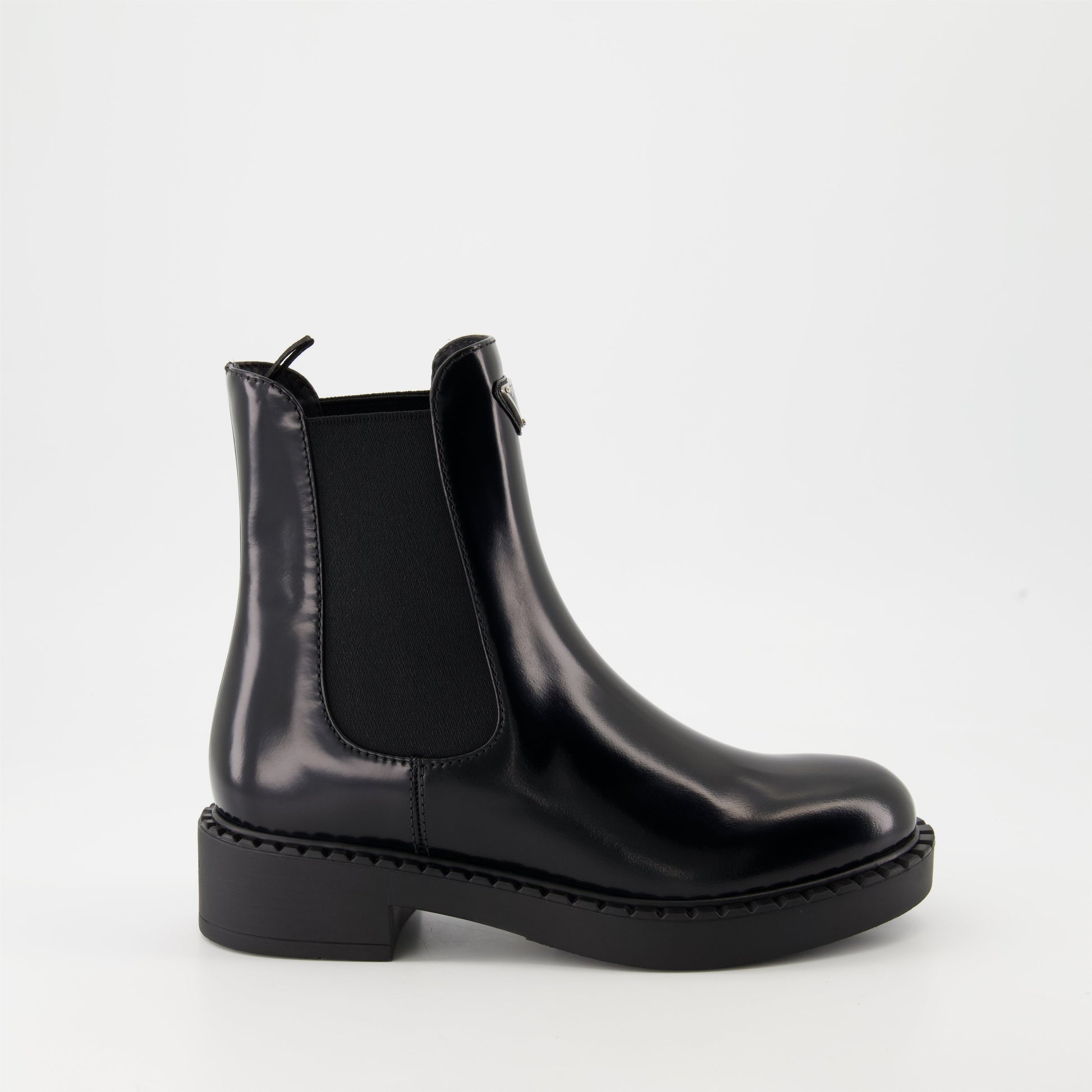   Patent leather boots, Prada ankle boots, black patent shoes, luxury footwear, autumn-winter collection.