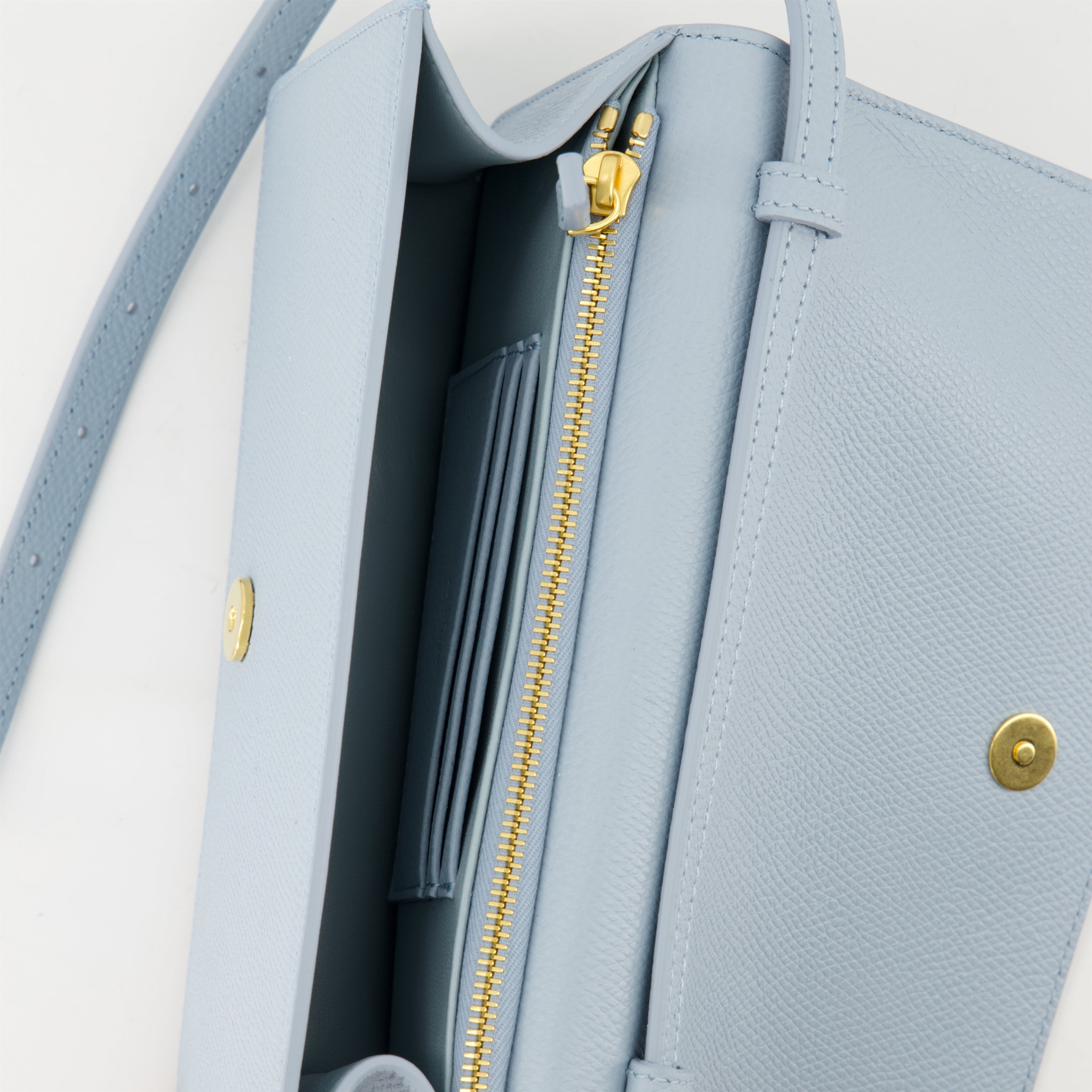 VLogo pouch, Valentino Garavani, leather accessory, spring-summer collection, blue handbag