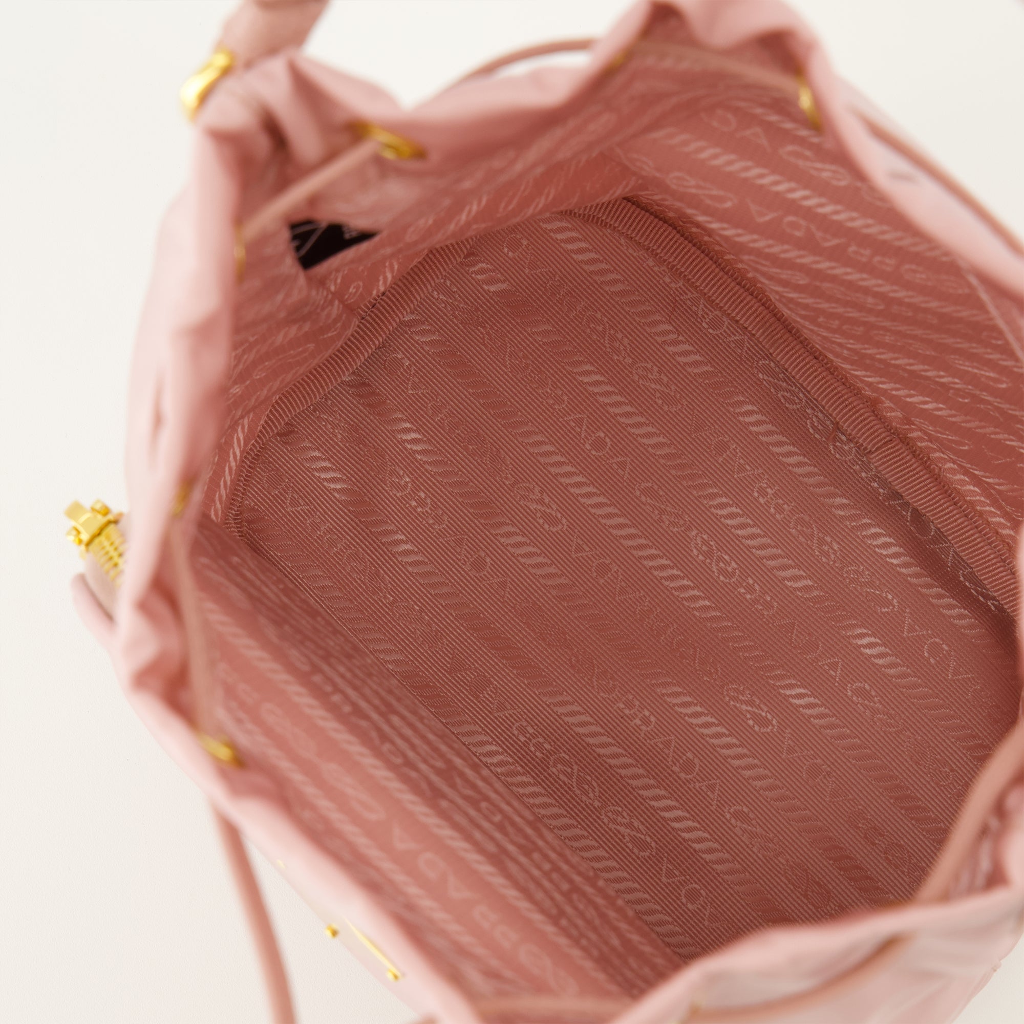 Image of Pink Re-Nylon Bucket Bag by Prada for Women - Season Spring-Summer 2026 - Detail View 2