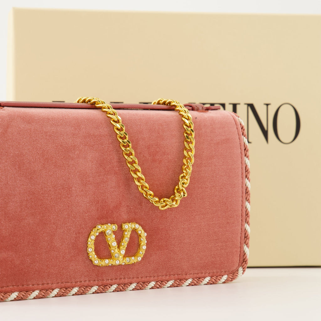 pink velvet clutch, Valentino Garavani, designer handbag, luxury accessories, Chic evening bag