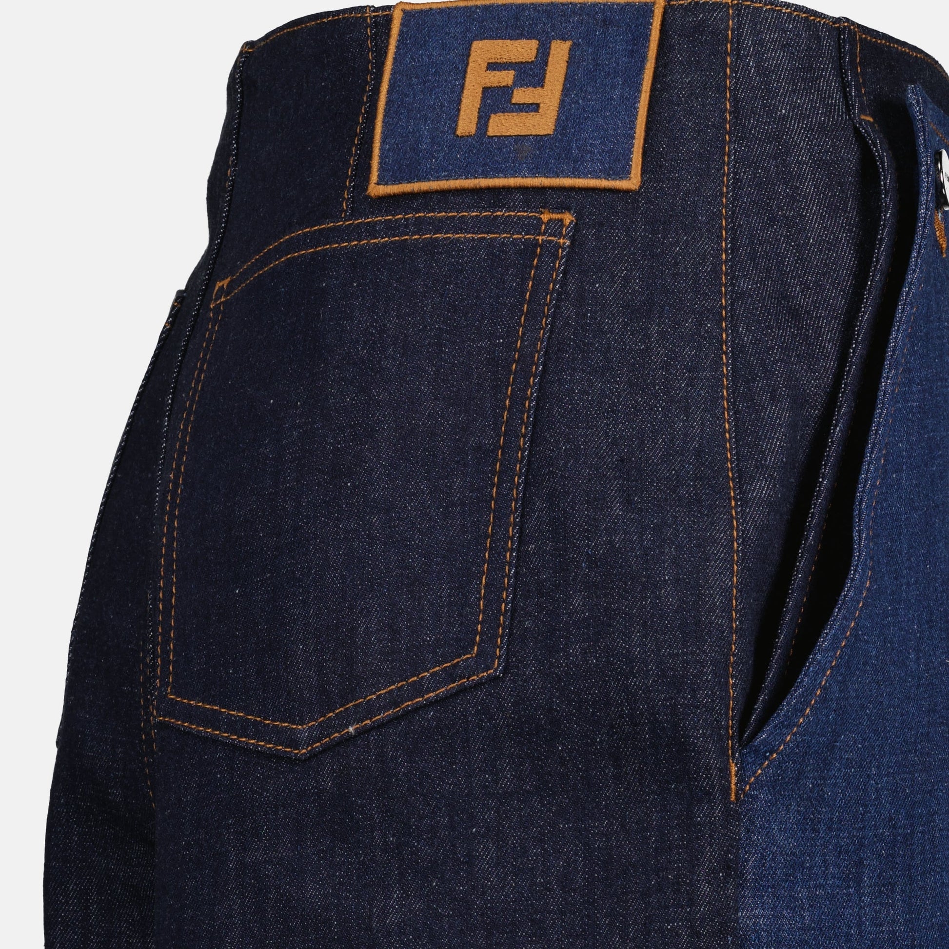 two-tone denim shorts, color block design, Fendi Autumn-Winter 2024, embroidered logo, chic denim shorts