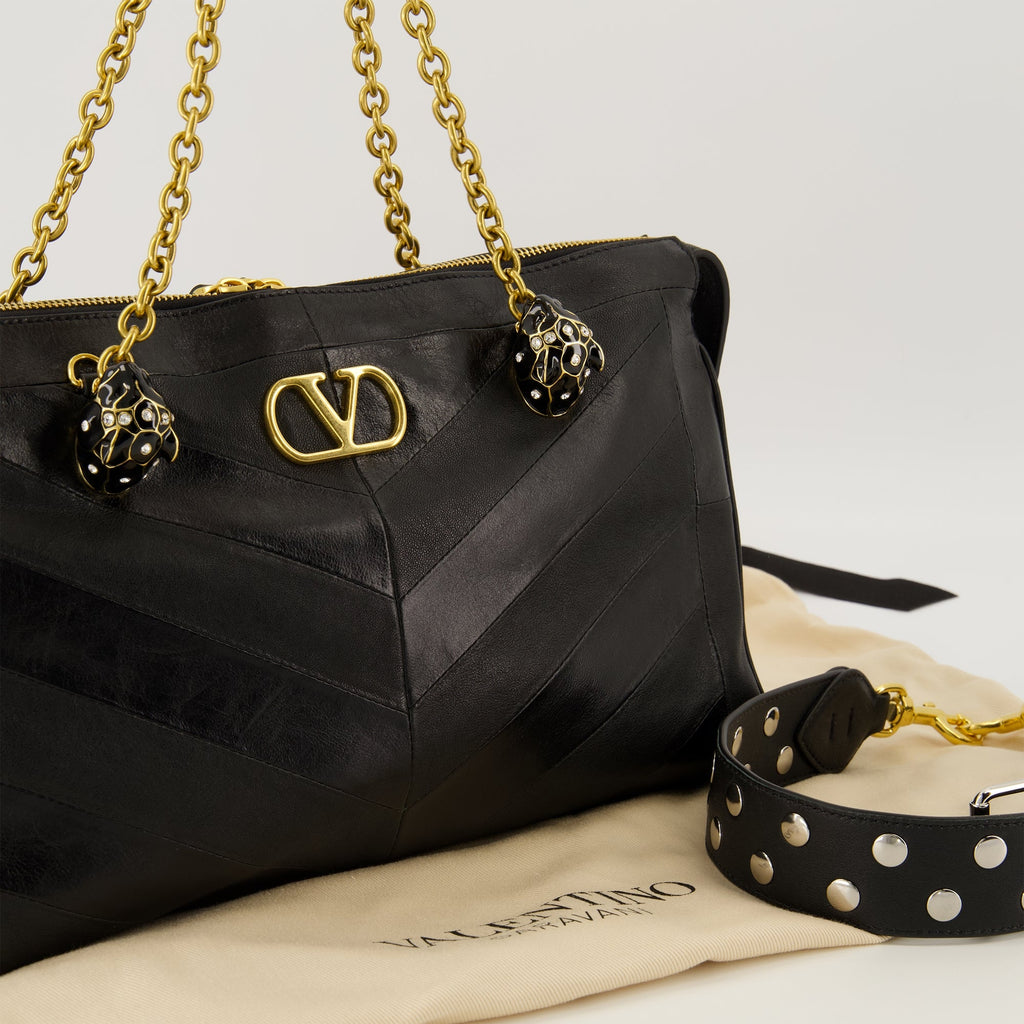 black leather bag, Valentino Garavani, nappa leather, designer bag, luxury accessory