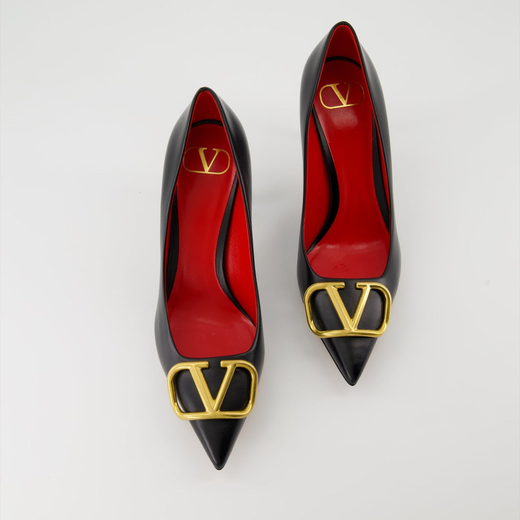   Valentino Garavani, black leather pumps, pointed-toe shoes, high-end fashion, luxury footwear