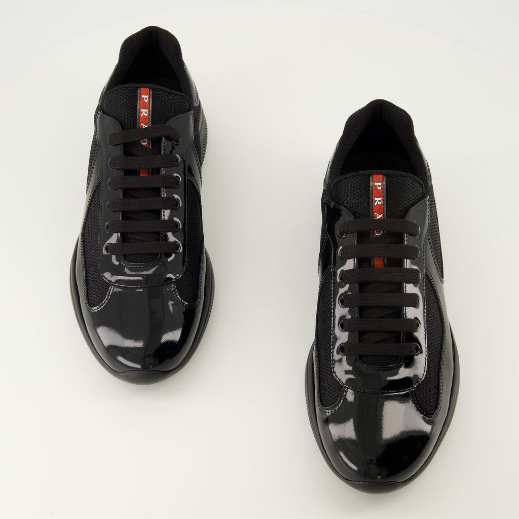 Prada sneakers, black calfskin shoes, sporty footwear, luxury lifestyle, designer sneakers