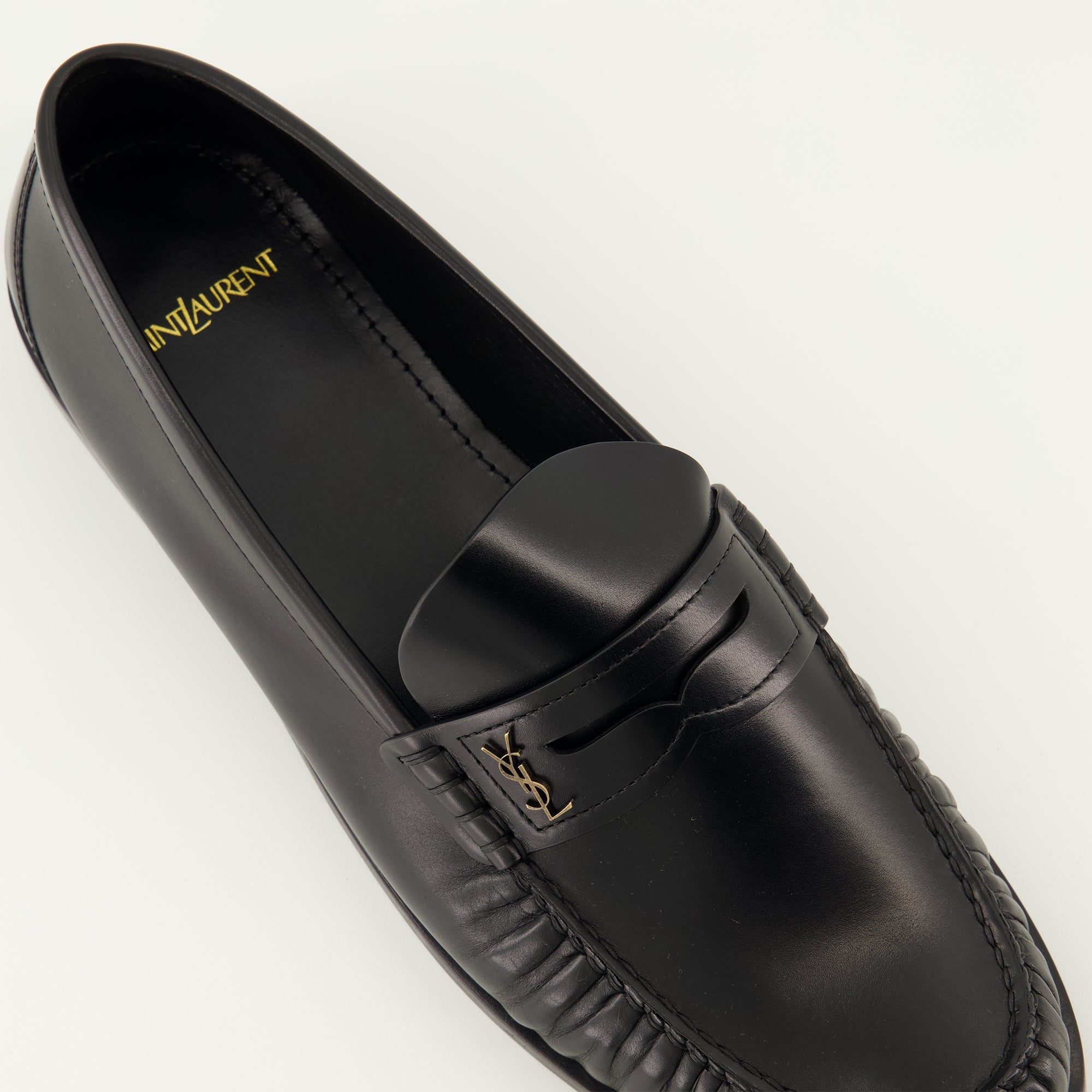 Saint Laurent loafers, black leather shoes, luxury footwear, rounded toe loafers, men's slip-on shoes