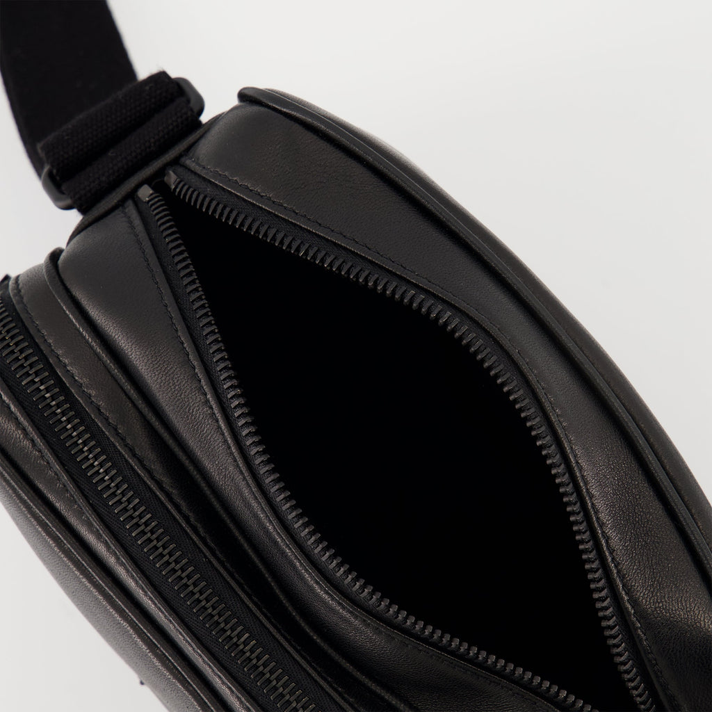 Saint Laurent camera bag, black leather accessory, luxury bag for men, Spring Summer 2025 collection, organized camera bag