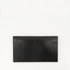 Uptown pouch, crocodile-effect accessory, Saint Laurent pouch, black leather pouch, Autumn-Winter 2025 collection