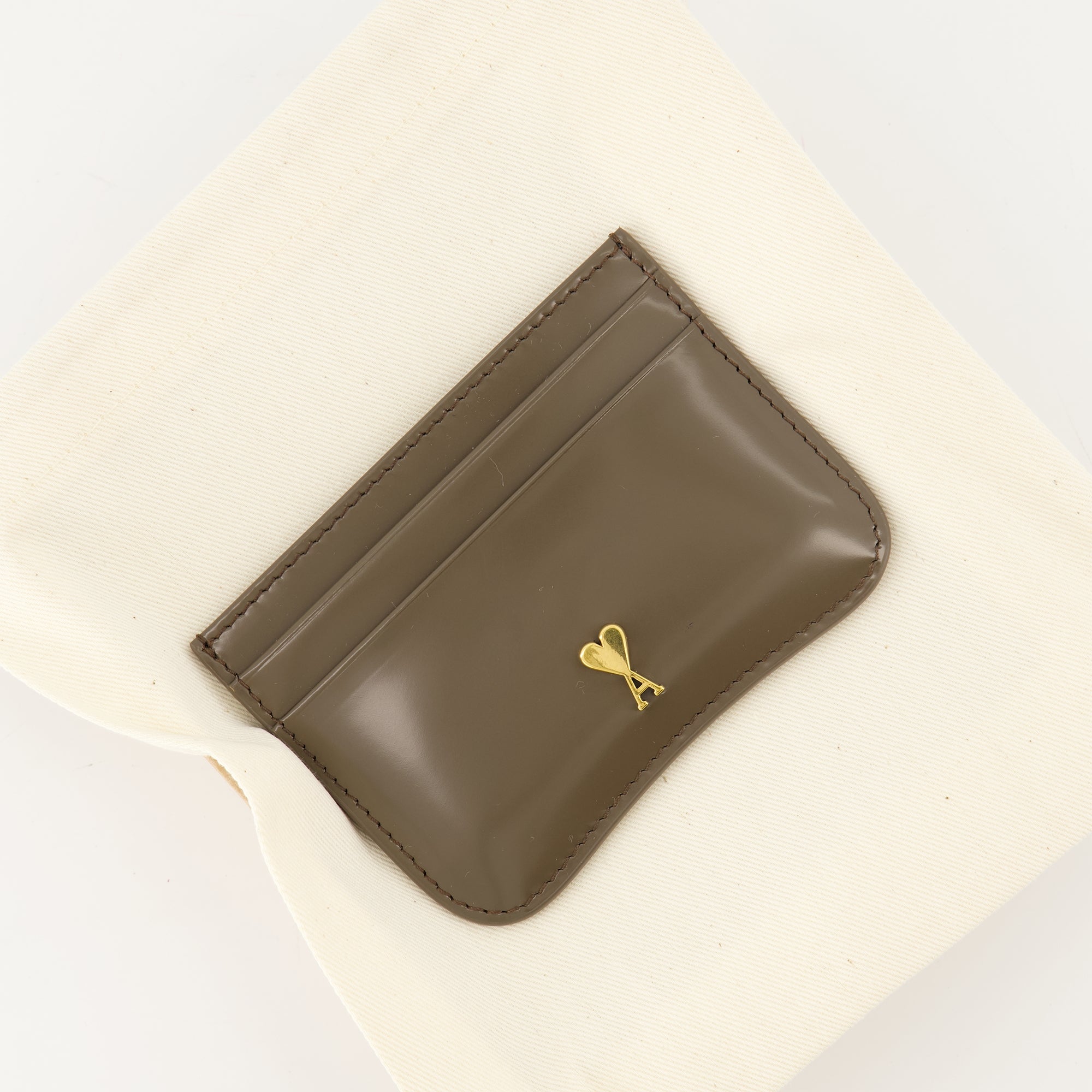 card holder, Ami Paris, brown leather accessory, premium quality, unisex design