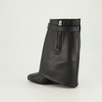 Image of Shark Lock Ankle Boots by Givenchy for Women - Season Spring-Summer 2025 - Back Right Three-Quarter View