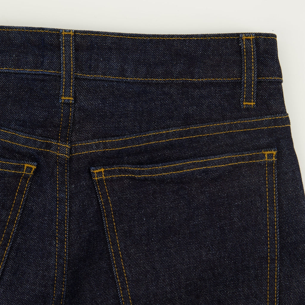 Khaite jeans, flare jeans, high-rise denim, deep blue jeans, five-pocket design