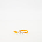 남성을 위한 발렌티노 가라바니의 오렌지 V로고 팔찌 코드 이미지 - 2025 봄-여름 시즌 - 정면 보기