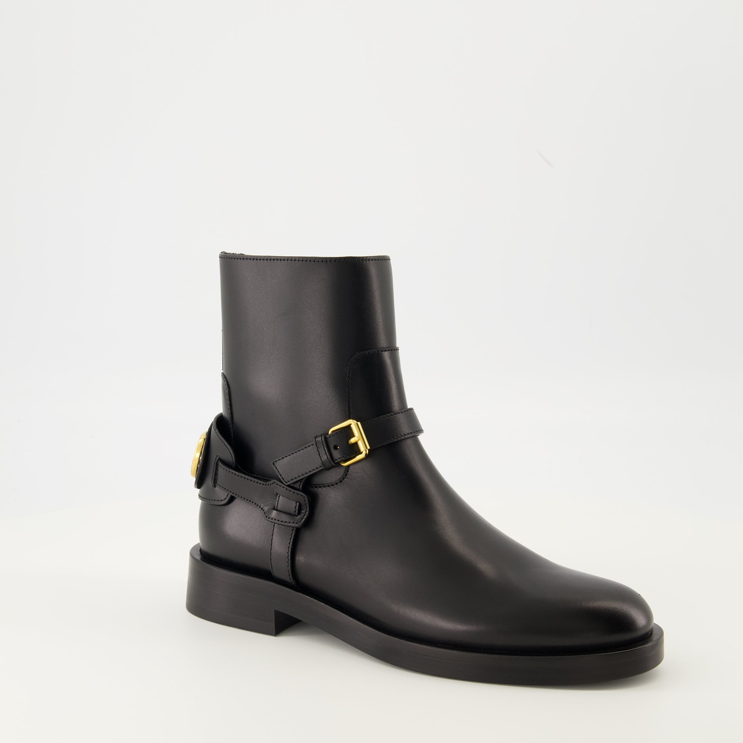 VLogo ankle boots, Valentino Garavani shoes, black leather boots, elegant footwear, designer ankle boots
