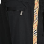 Image of Burberry Black Sweatpants by Burberry for Men - Season Autumn-Winter 2025 - Detail View 1