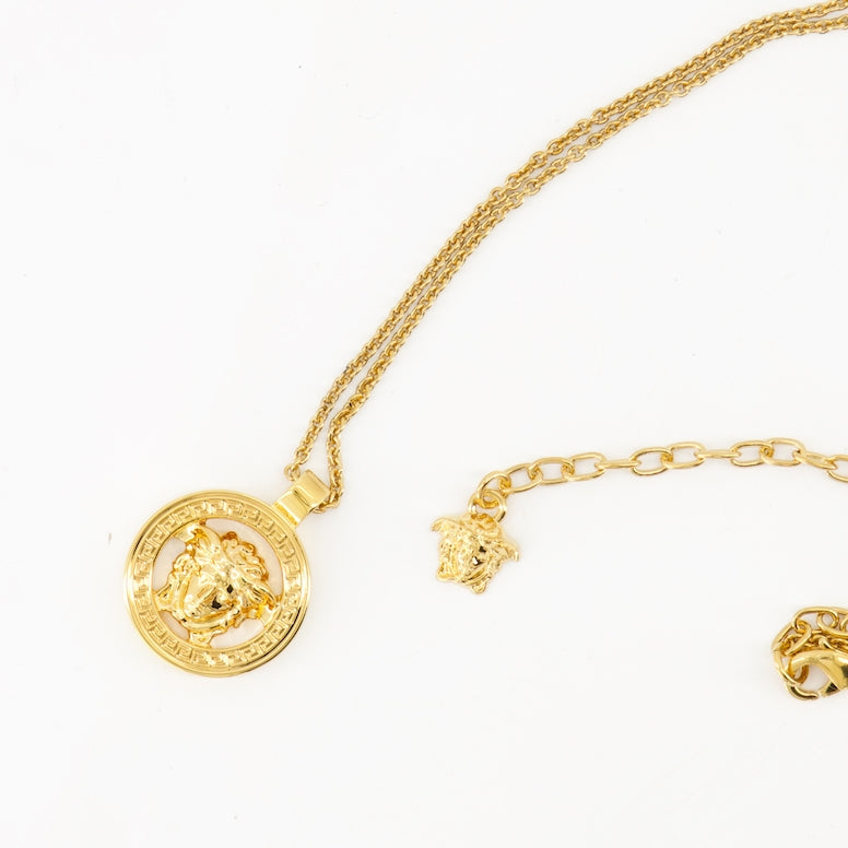 Versace jewelry, gold necklace, Medusa emblem, luxury accessories, Autumn-Winter 2024