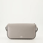 crossbody bag, gray leather bag, studded handbag, luxury accessory, designer handbag