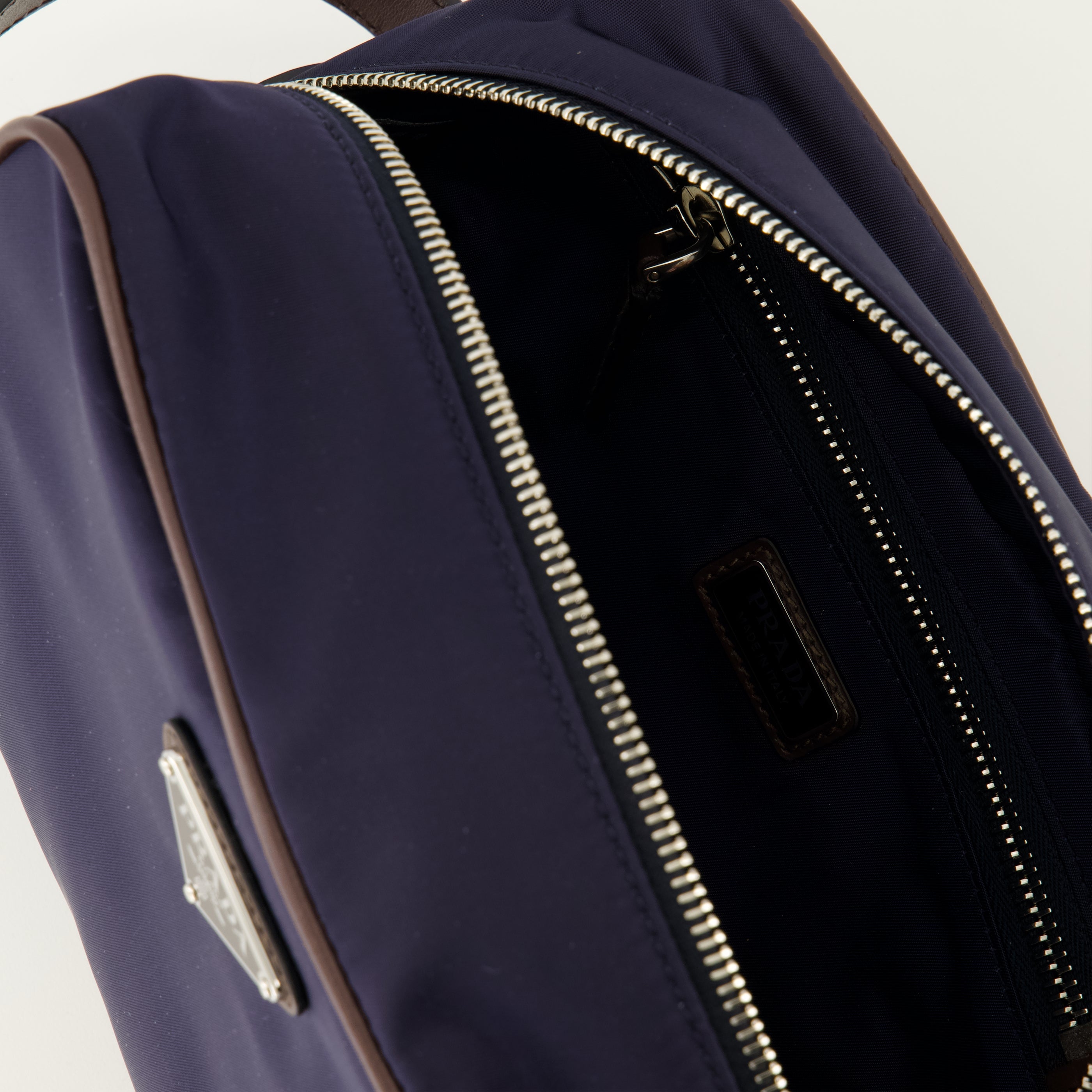 Mini Pouch in Re-Nylon and Black Leather - Prada - Men | WE IN STYLE