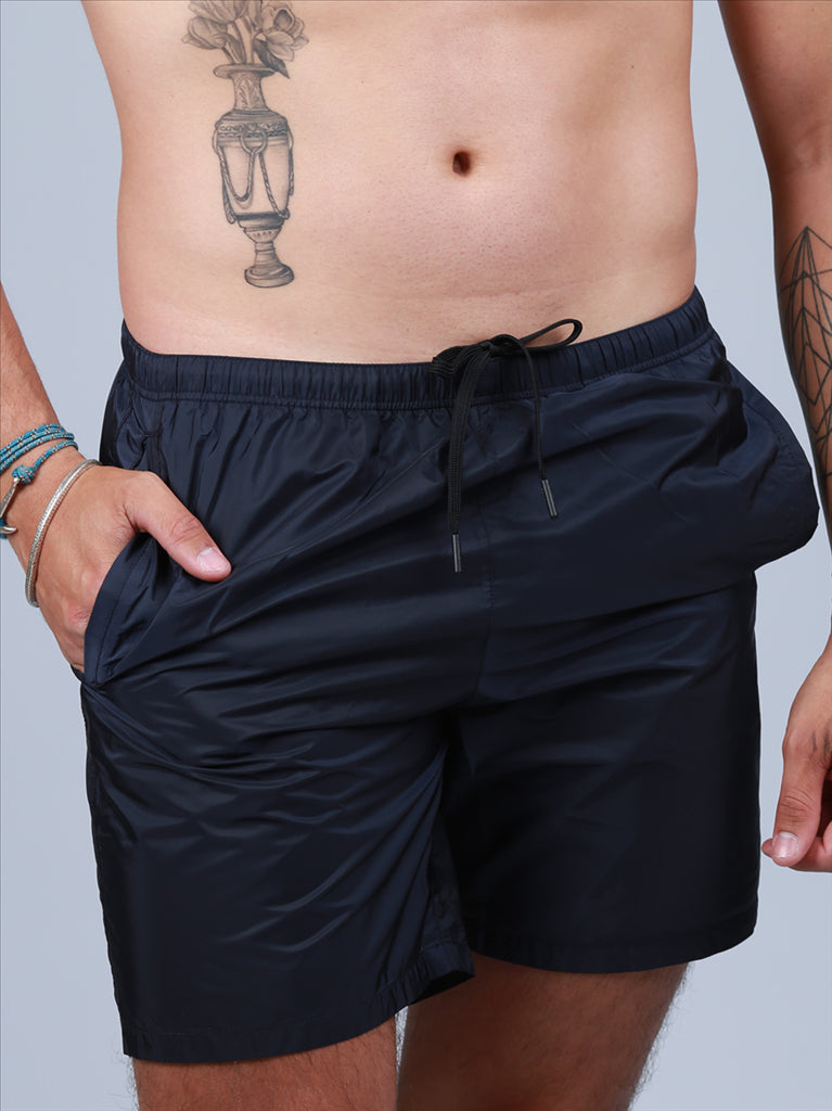 Prada, men's swim trunks, luxury swimwear, blue swim shorts, designer swimwear
**